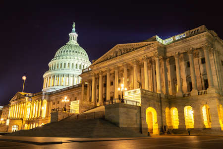 The United States Capitol building at sunset at night in Washington DC, USAのeditorial素材