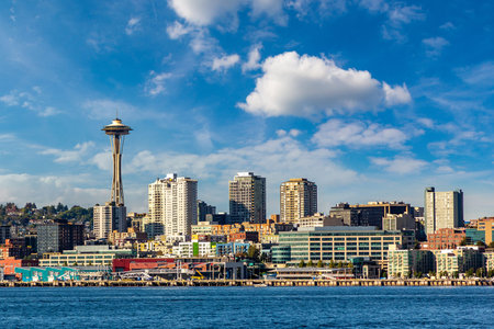 Panoramic view of Seattle cityscape and Space Needle at Elliott Bay in a sunny day, Washington, USA