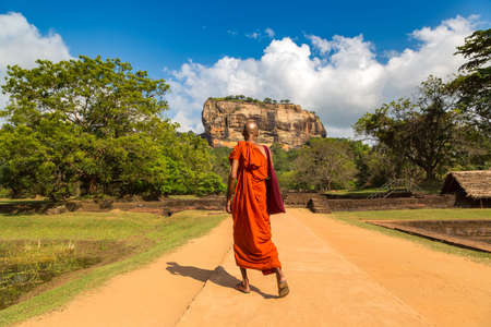 Buddhist monk at  Lion Rock in Sigiriya, Sri Lankaの写真素材