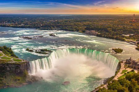 Panoramic aerial view of Canadian side view of Niagara Falls, Horseshoe Falls at sunset  in Niagara Falls, Ontario, Canadaの写真素材