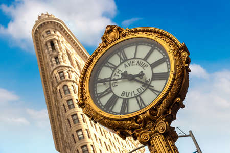 NEW YORK CITY, USA - MARCH 15, 2020: 5th Avenue Clock and Flatiron Building in New York City, USAのeditorial素材