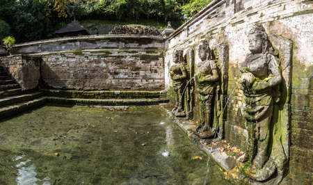 Panorama of  Sacred pond at Pura Goa Gajah (Elephant cave temple), in Bali, Indonesiaの写真素材