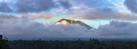 Panorama of Sunset at Rice terrace field and volcano Agung on Bali, Indonesia in a sunny dayの写真素材