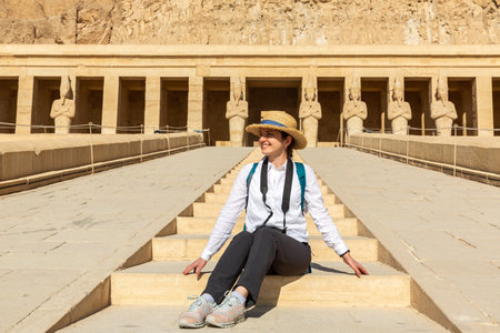 Woman traveler at Temple of Queen Hatshepsut, Valley of the Kings, Egyptの写真素材