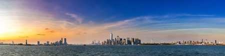 Panorama of Statue of Liberty and Manhattan and  New Jersey city  in New York City, NY, USA