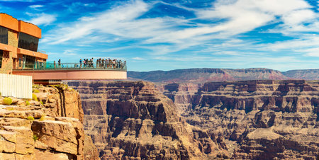 ARIZONA, USA - MARCH 29, 2020: Panorama of  Tourist enjoying the view at Grand Canyon Skywalk observation point at Grand Canyon West Rim, Arizona, USAのeditorial素材