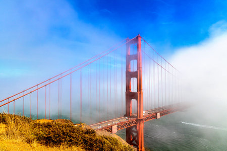 Golden Gate Bridge surrounded by Fog in San Francisco, California, USA