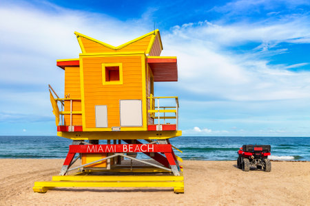 Lifeguard tower and a beach rescue car in South beach, Miami Beach in a sunny day, Floridaの写真素材