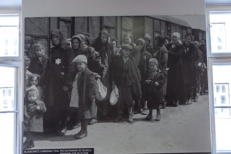OSWIECIM, POLAND - SEPTEMBER 7, 2022: Photo Exhibition in Auschwitz concentration camp in a sunny...
