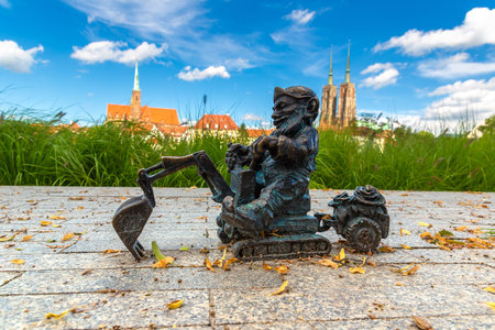 WROCLAW, POLAND - SEPTEMBER 21, 2022: Symbol of Wroclaw - Sculpture of dwarf (gnome) from fairy-tale in a sunny day, Wroclaw, Polandのeditorial素材