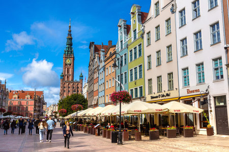 GDANSK, POLAND - SEPTEMBER 7, 2022: Street in an Old town and Town Hall in Gdansk, Poland