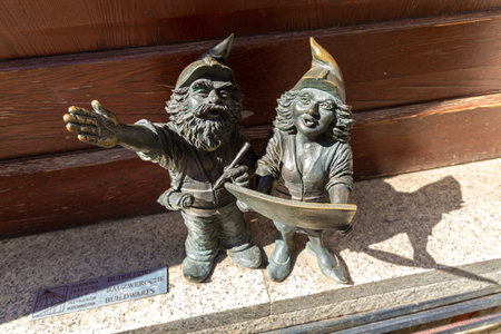WROCLAW, POLAND - SEPTEMBER 21, 2022: Symbol of Wroclaw - Sculpture of dwarf (gnome) from fairy-tale in a sunny day, Wroclaw, Polandのeditorial素材