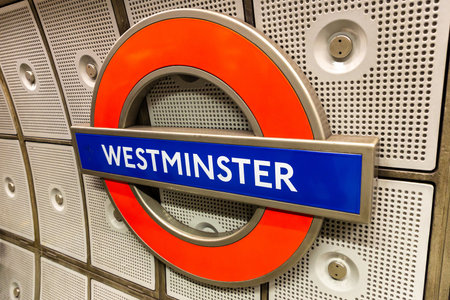 LONDON, THE UNITED KINGDOM - JUNE 26, 2022: A sign of Westminster underground station in London, England, UKのeditorial素材