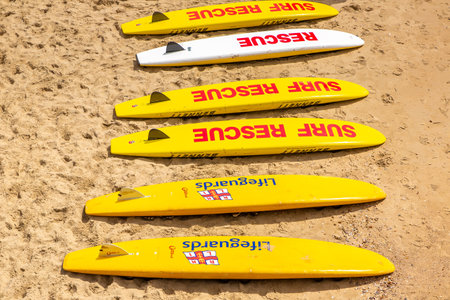BOURNEMOUTH, THE UNITED KINGDOM - JUNE 25, 2022: RNLI Lifeguard rescue board on Bournemouth beach in a sunny summer day in Bournemouth, Dorset, UKのeditorial素材