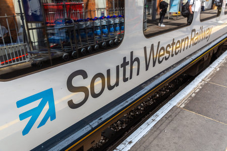 BOURNEMOUTH, THE UNITED KINGDOM - JUNE 25, 2022: Logo of South Western Railway on a train, The...