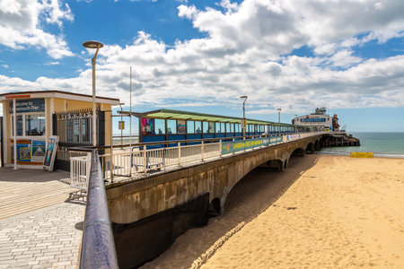 BOURNEMOUTH, THE UNITED KINGDOM - JUNE 25, 2022: Bournemouth Pier in a summer day in Bournemouth,...