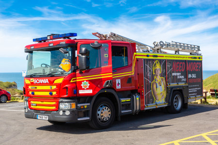 FLAMBOROUGH, UK - JUNE 12, 2022: Modern Fire engine truck in Flamborough in a summer day, Yorkshire, UKのeditorial素材
