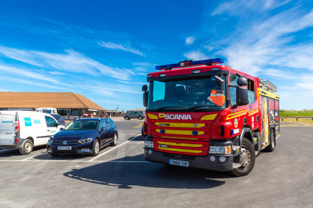 FLAMBOROUGH, UK - JUNE 12, 2022: Modern Fire engine truck in Flamborough in a summer day, Yorkshire, UKのeditorial素材