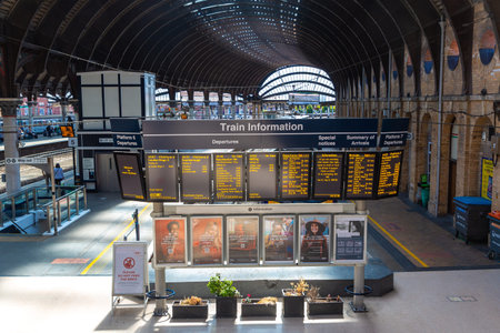 YORK, UK - JUNE 30, 2022: An electronic notice board at York train station in a summer day, York,...