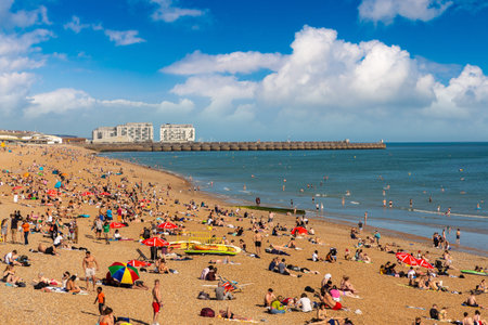 BRIGHTON, UK - JUNE 29, 2022: Brighton beach in a sunny summer day in Brighton, East Sussex,...