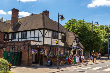 WINDSOR, UK - JUNE 19, 2022: The facade of a traditional fachwerk building in Popular tourist...