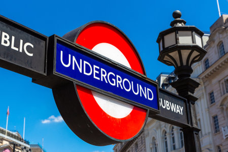 LONDON, UK - JUNE 17, 2022: London underground sign outdoor in a sunny summer day in London, UKのeditorial素材