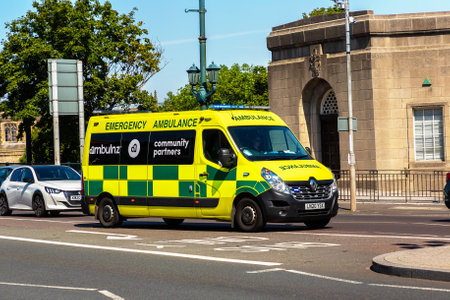 NEWCASTLE UPON TYNE, UK - JUNE 28, 2022: Emergency ambulance car in Newcastle upon Tyne in a summer sunny day, UKのeditorial素材