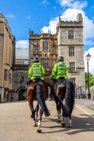 BRISTOL, UK - JUNE 29, 2022: Mounted Police Officer in front of Bristol Central Library in Bristol...