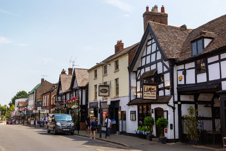STRATFORD-UPON-AVON, UK - JUNE 11, 2022: Old fachwerk Half-timbered house in in Stratford upon Avon in a summer day, UKのeditorial素材