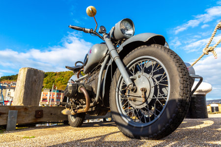 SCARBOROUGH, UK - JULY 27, 2022: Old Retro Motorcycle with sidecar in Scarborough, Yorkshire in a sunny summer day, UKのeditorial素材