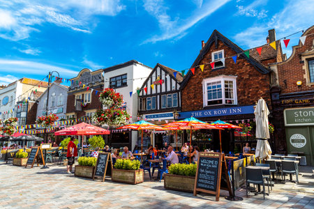SALISBURY, UK - JUNE 17, 2022: Street pub at typical street in Salisbury in a sunny summer day, UKのeditorial素材