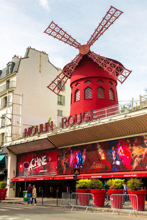 PARIS, FRANCE - JUNE 01, 2022: Moulin Rouge is a famous cabaret in red-light district of Paris in a summer day, Franceのeditorial素材