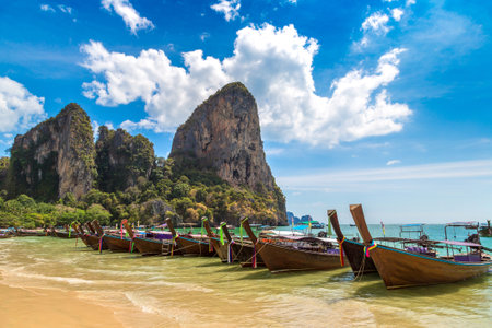 Thai traditional wooden longtail boat at Railay Beach in Krabi, Ao Nang, Thailandのeditorial素材