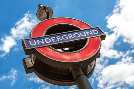 LONDON, UK - JUNE 17, 2022: London underground sign outdoor in a sunny summer day in London, UKのeditorial素材