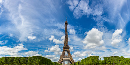 Panorama of Eiffel Tower in Paris in a sunny summer day, France