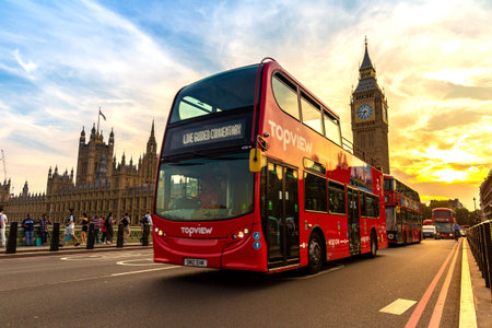LONDON, UK - SEPTEMBER 7, 2023: Open-top Hop-on Hop-off Bus - Topview on the Westminster Bridge and...