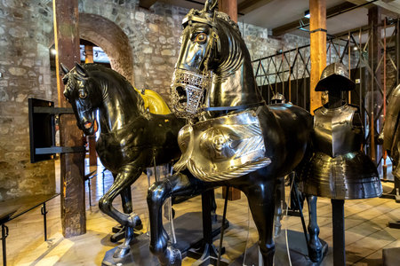 LONDON, UK - SEPTEMBER 26, 2023: Medieval knights armours in the armoury of the Tower of London in London, England, UKのeditorial素材