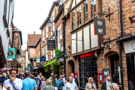 YORK, UK - AUGUST 28, 2023: The Shambles - a medieval street in Old Town in York in a summer day, North Yorkshire, UKのeditorial素材