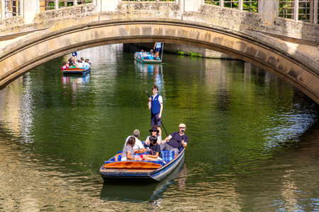 CAMBRIDGE, UK - SEPTEMBER 6, 2023: Bridge of Sighs and punting boat at Cambridge, St. John's...
