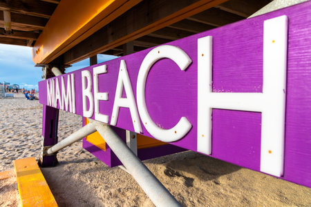 Close-up of Miami Beach sign on Lifeguard tower in South beach, Miami Beach in a sunny day, Floridaの写真素材