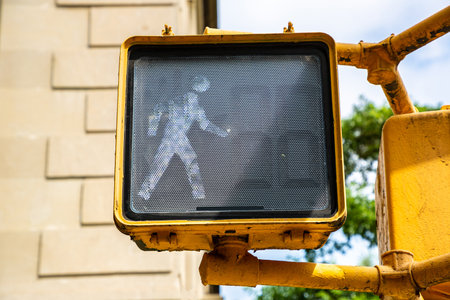 White "Walk sign" pedestrian traffic light in New York City, NY, USAの写真素材