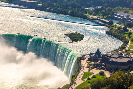 Panoramic aerial view of Canadian side view of Niagara Falls, Horseshoe Falls in a sunny day  in Niagara Falls, Ontario, Canadaの写真素材