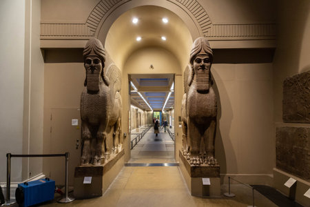 LONDON, UK - JANUARY 27, 2025: Massive lamassu statues, Assyrian winged bulls with human heads,...