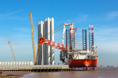 HULL, UK - MAY 11, 2025: The Wind Peak, a modern offshore wind installation vessel in Hull, England,...