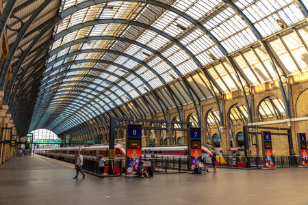 LONDON, UK - JULY 22, 2024: Interior view of Kings Cross railway station with Azuma train and...