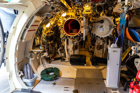 GOSPORT, UK - AUGUST 22, 2024: Torpedo tube and mechanical systems inside HMS Alliance submarine at...