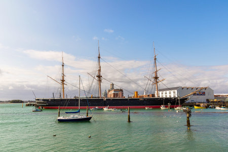 PORTSMOUTH, UK - AUGUST 21, 2024: Famous HMS Warrior 1860 ironclad warship moored in Portsmouth...