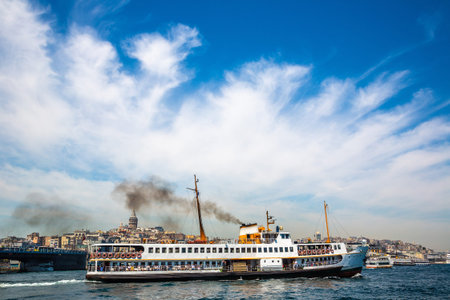 Passenger ferry in a gulf of the Golden Horn in Istanbul, Turkey in a sunny dayの写真素材