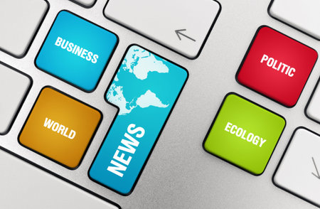 News concept on modern aluminium keyboard.
