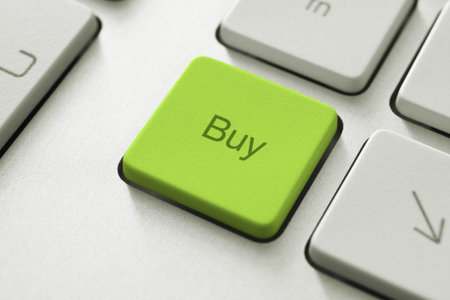 Buy button on the keyboard. Toned Image.